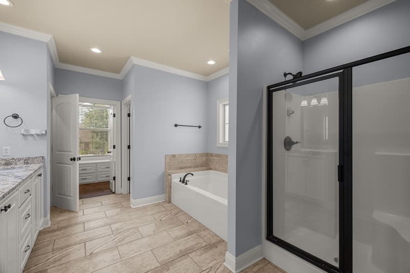 Bathroom tub shower at 30 Broad Leaf Cove, Petal, Mississippi