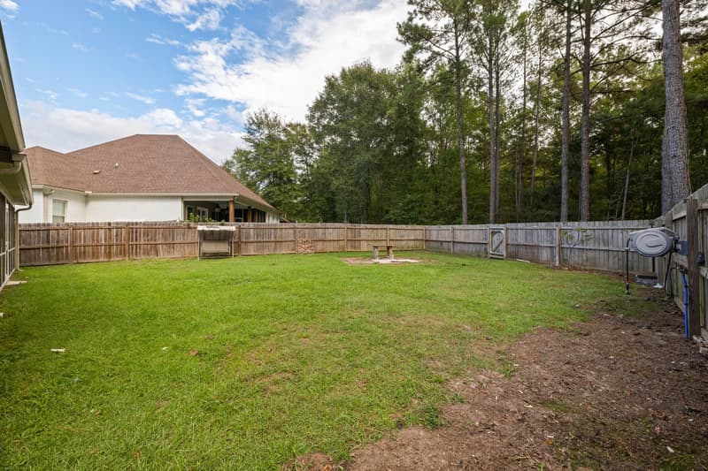 Backyard lawn at 30 Broad Leaf Cove, Petal, Mississippi