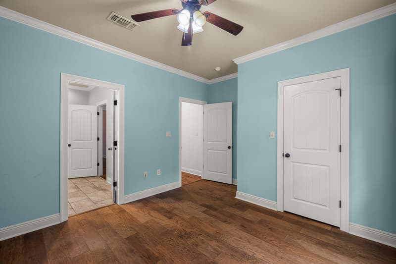 Blue bedroom at 30 Broad Leaf Cove, Petal, Mississippi