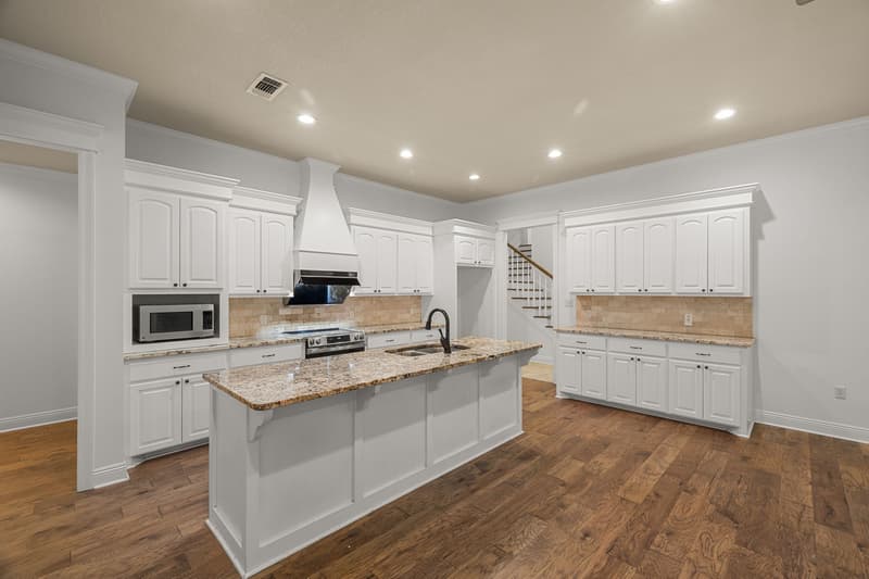 Kitchen cabinets island at 30 Broad Leaf Cove, Petal, Mississippi