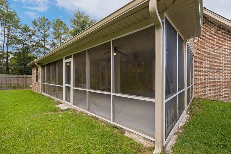 Screened porch exterior at 30 Broad Leaf Cove, Petal, Mississippi