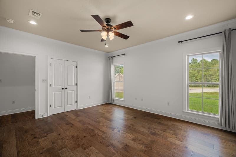 Bedroom windows at 30 Broad Leaf Cove, Petal, Mississippi