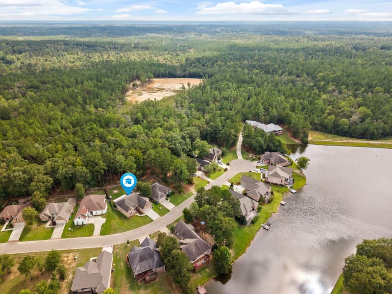 Aerial neighborhood lake at 30 Broad Leaf Cove, Petal, Mississippi