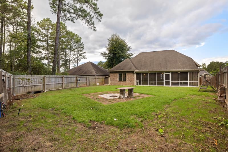 Backyard rear exterior at 30 Broad Leaf Cove, Petal, Mississippi