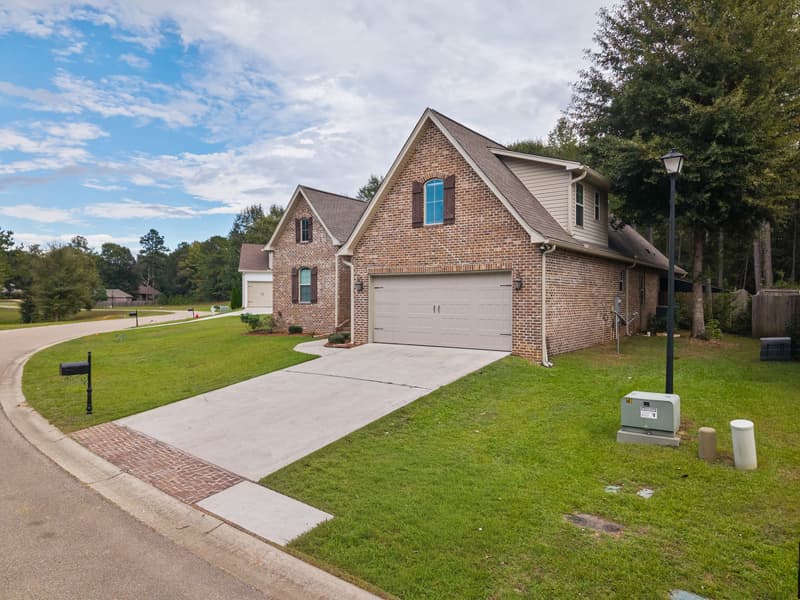 Corner lot exterior at 30 Broad Leaf Cove, Petal, Mississippi